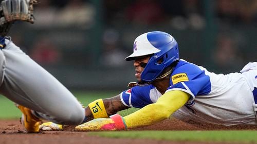 Atlanta Braves' Ronald Acuna Jr. steals second base during the first inning of the team's baseball game against the Milwaukee Brewers on Saturday, July 29, 2023, in Atlanta. (AP Photo/John Bazemore)