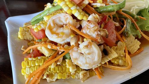 Thai corn salad comes with shrimp at Tum Pok Pok. Angela Hansberger for The Atlanta Journal-Constitution