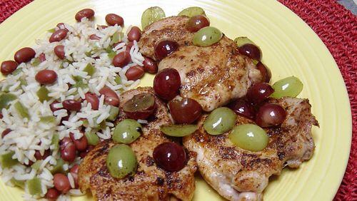 Cajun chicken. Hot Cajun spices are contrasted with sweet grapes. (Linda Gassenheimer/TNS)