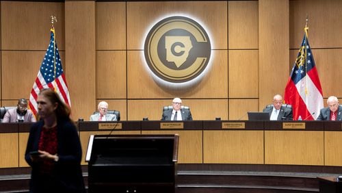 The Cobb County School Board listens to public comment during a school board meeting in Marietta on Thursday, August 17, 2023. The school district appealed a judge's order that its district map passed in 2022 be redrawn in a federal lawsuit. (Arvin Temkar/arvin.temkar@ajc.com)