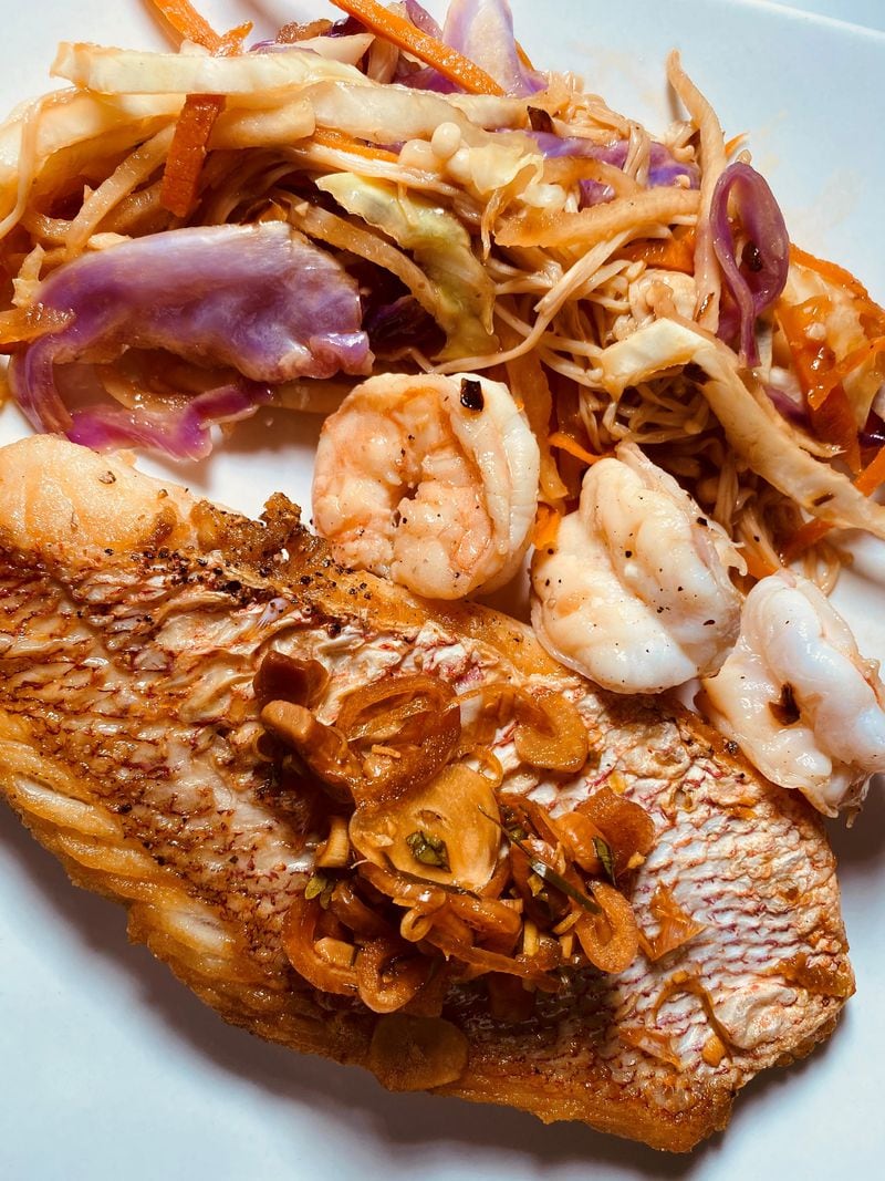 American red snapper is served at Canoe with Georgia shrimp, cabbage “pad thai,” enoki mushrooms and cashew relish. Bob Townsend for The Atlanta Journal-Constitution 