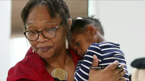 Wanda Irving holds her granddaughter, Soleil, at their home in Sandy Springs.  Soleil's mother, Shalon Irving, died three weeks after giving birth.