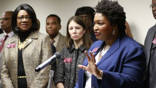 House Minority Leader Stacey Abrams (right), D - Atlanta, outlines the caucus legislative agenda in 2016. State Rep. Stacey Evans is at her immediate left. Both are running for governor. BOB ANDRES / BANDRES@AJC.COM