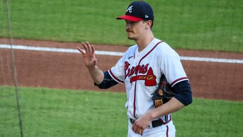 Atlanta Braves starting pitcher Max Fried waves to fans before he pitches during the Atlanta Braves post season workouts in preparation for the MLB Playoffs at Truist Park, Tuesday, October 3, 2023, in Atlanta. The Braves first playoff game will be on Saturday, Oct. 7, 2023 at Truist Park for game one of the NLDS. (Jason Getz / Jason.Getz@ajc.com)
