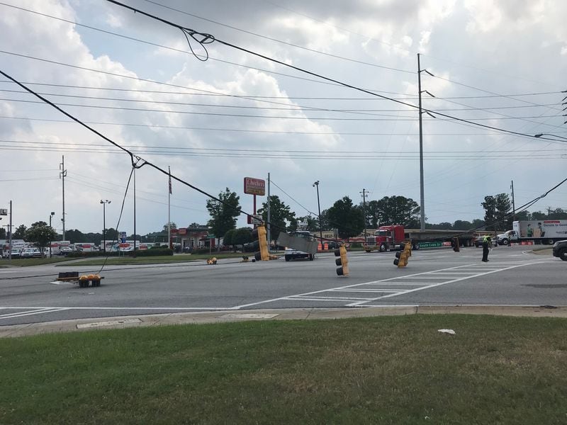 A busy intersection at Windy Hill Road and South Cobb Drive is shut down. (Credit: Smyrna Police Department)