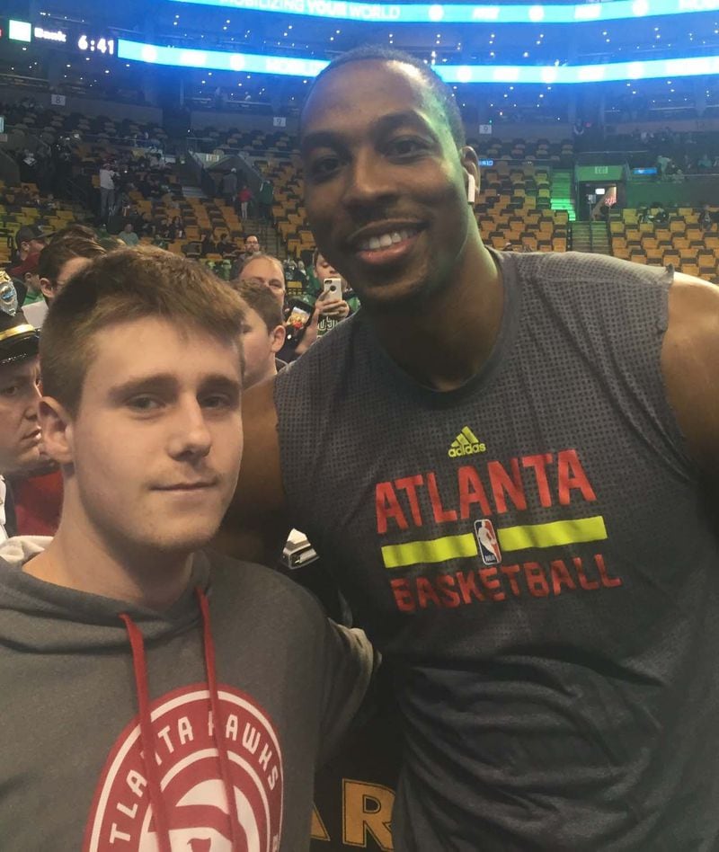 Hawks center Dwight Howard poses with 17-year-old Connor Spencer in Boston before Monday’s game against the Celtics. Howard gave Bador his jersey after being ejected. Photo provided by The Bador Family
