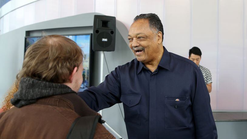 The Rev. Jesse Jackson greets students before a March event at the Georgia State University School of Film, Media & Theatre. Photo courtesy of GSU / JASON GETZ