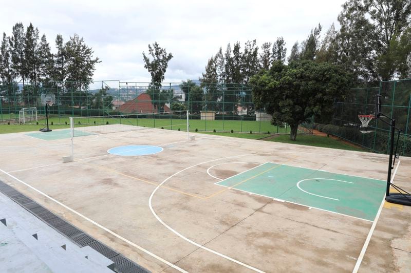 A basketball court with a volleyball play ground at Hope Hostel, where U.K. asylum seekers from the U.K. are expected to arrive in the next 10-12 weeks in Kigali, Rwanda, Wednesday, April 24, 2024. The management of the hostel where the migrants are to stay in, Hope Hostel, says the facility is ready to accommodate 100 migrants. (AP Photo/Atulinda Allan)