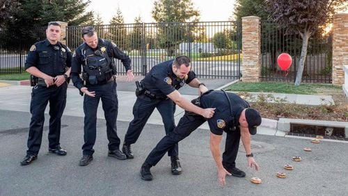 Police officers in Lincoln, California, posted a parody "hot cop challenge" photo on Facebook Friday, Sept. 15, 2017, that takes its inspiration from the wildly popular big screen version of Stephen King's "It."