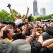 Crowd-surfing is always a popular activity at Shaky Knees, as can be seen in this photo from Saturday afternoon, May 4, 2024 as Bad Nerves performed. (RYAN FLEISHER FOR THE ATLANTA JOURNAL-CONSTITUTION)