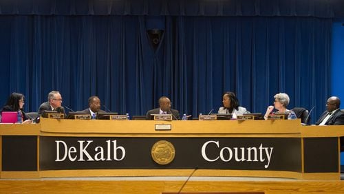 The DeKalb County Board of Commissioners significantly reduced deficits when passing a $1.27 billion budget last month. In this photo, the commissioners were holding a meeting Jan. 10, 2017. STEVE SCHAEFER / SPECIAL TO THE AJC