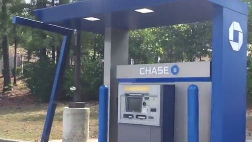A woman was robbed at a Chase Bank ATM in Sandy Springs.
