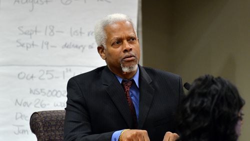 September 30, 2014 DeKalb: U.S. Rep. Hank Johnson , a character witness for suspended DeKalb County CEO Burrell Ellis listens to a question from DeKalb District Attorney Robert James Tuesday September 30, 2014. Ellis is fighting charges that he intimidated companies doing business with DeKalb County into giving him campaign contributions. BRANT SANDERLIN / BSANDERLIN@AJC.COM