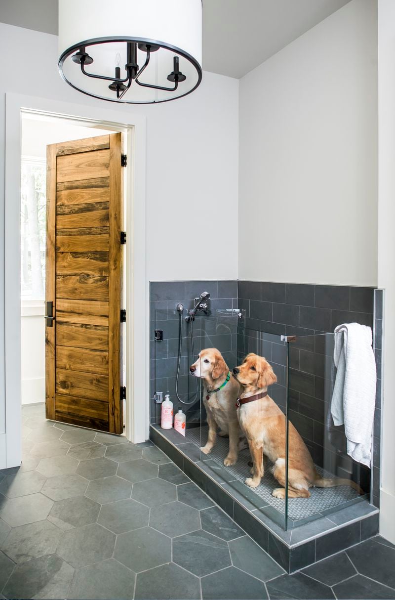 A mudroom like this one with an area to wash dogs is a great way to keep out pet messes tracked in from outside.
(Courtesy of The Jane Group/Photo by Jeff Herr Photography Inc.)