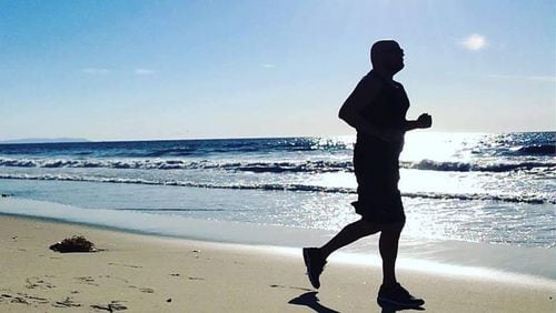KP Kelly ran on the beach in Santa Monica, California during eight days of his #100Run challenge. He is running 100 marathons in 100 days for charities across the country, and just completed a marathon in Atlanta. (Courtesy KP Kelly)