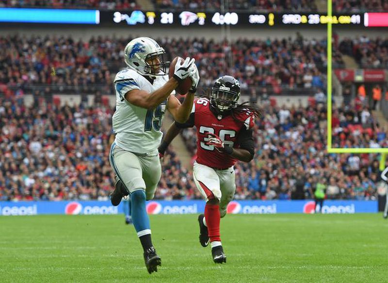 Tim Ireland Detroit Lions wide receiver Golden Tate (15) catches the ball to score a touchdown during the NFL football game against Atlanta Falcons at Wembley Stadium, London, Sunday, Oct. 26, 2014. (AP Photo/Tim Ireland)