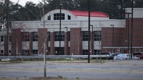 Backpacks were banned at Banneker High School after two students were injured after a gun accidentally went off in a classroom.