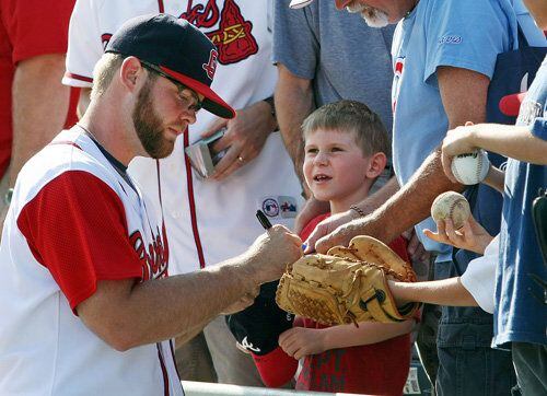 MLB Photos: Brian McCann tests new eye glasses