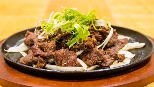 Traditional beef bulgogi made with rib-eye at Dish Korean Cuisine. CONTRIBUTED BY HENRI HOLLIS