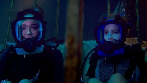 Lisa, played by Mandy Moore, and Kate, played by Claire Holt, are stuck at the bottom of the ocean floor after their shark-diving excursion goes terribly wrong in “47 Meters Down.” Contributed by Entertainment Studios Motion Pictures