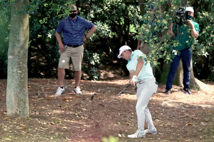April 10, 2021, Augusta: Jordan Spieth hits out of the rough on the eighth hole during the third round of the Masters at Augusta National Golf Club on Saturday, April 10, 2021, in Augusta. Curtis Compton/ccompton@ajc.com