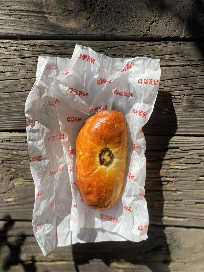 Hero Doughnuts & Buns uses its brioche dough for this sausage-stuffed kolache with jalapeño. Wendell Brock for The Atlanta Journal-Constitution