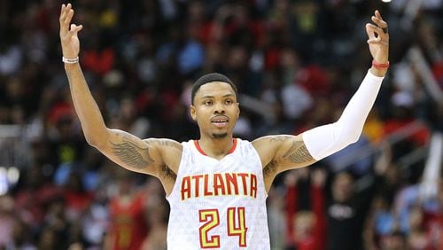 Atlanta Hawks Kent Bazemore looks to the fans to cheer after hitting a three pointer against the Washington Wizards during a 111-101 victory in game 4 of a first-round NBA basketball playoff series on Monday, April 24, 2017, in Atlanta.  Curtis Compton/ccompton@ajc.com