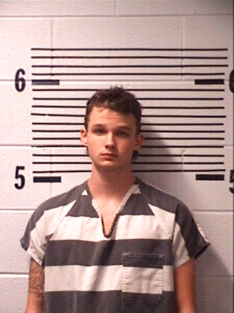 A photo provided by the Elmore County Ala. Sheriff's Office shows William Chase Johnson, a suspect in the fatal shooting of Lowndes County Sheriff John Williams.