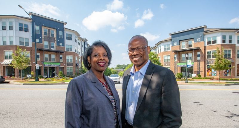 The Integral Group, including President of Real Estate Vicki Lundy Wilbon, left, and Chairman Egbert Perry, right, is developing Scholars Landing along Atlanta Student Movement Boulevard near Clark Atlanta University on Monday, June 5, 2023. The development has multi-family housing, independent senior living units and more lots ready for development soon. Both leaders are involved in the Integral Collaborative.   (Jenni Girtman for The Atlanta Journal-Constitution)