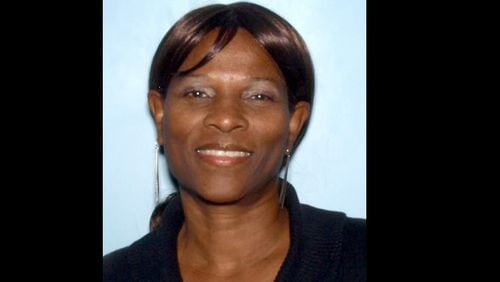 Paulette Smith, seen in a driver's license photo, has been charged with theft and exploitation of an at-risk adult.