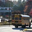 A Gwinnett school bus makes its way for drop offs on Nov. 7. (Hyosub Shin / Hyosub.Shin@ajc.com)