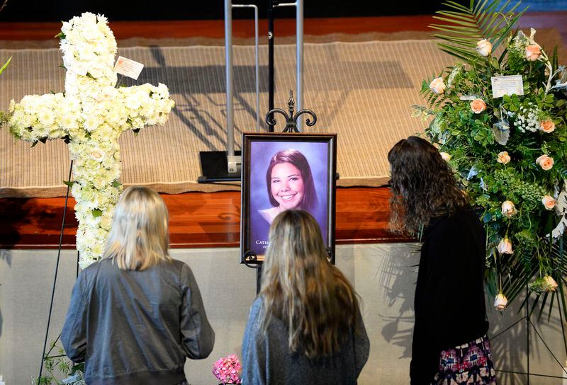 Mourners view a photograph of Catherine “McKay” Pittman, 21, one of five Georgia Southern University nursing students killed in an I-16 highway crash in April, during services at First Baptist Church of Alpharetta. DAVID TULIS / SPECIAL