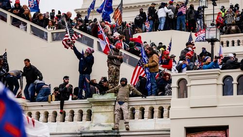 A pro-Donald Trump mob storms the U.S. Capitol following a rally with the then-president on Jan. 6 in Washington. (Samuel Corum/Getty Images/TNS)