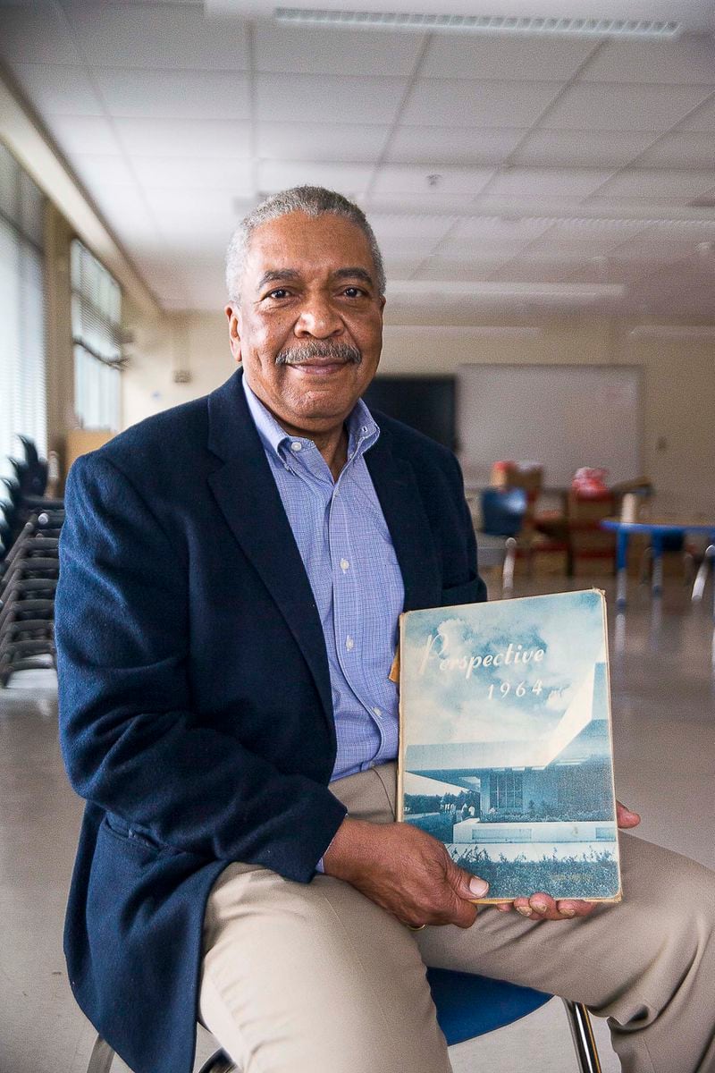 Harper-Archer High School graduate Artie Cobb sits for a portrait with a vintage Harper-Archer High School yearbook at Harper-Archer Elementary School in Atlanta's Fairburn Heights neighborhood, Thursday, January 16, 2020.  Cobb was one of the first graduates of Harper-Archer High School. The high school has been renovated and turned into an Atlanta Public Schools "Turnaround" elementary school. The school now serves Pre-K through 5th grade within the APS Douglas High School cluster. (ALYSSA POINTER/ALYSSA.POINTER@AJC.COM)
