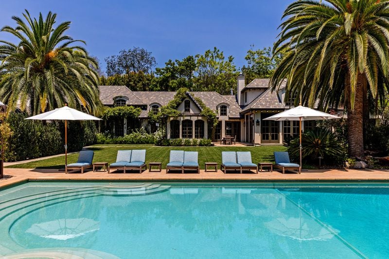 

Set on 1.25 acres in Beverly Hills, the manicured grounds hold a French country-inspired mansion, two guesthouses and a 60-foot swimming pool. (The Agency)