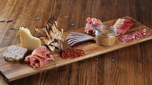 A charcuterie plate at Saltwood Charcuterie & Bar, which recently opened inside the Loews Atlanta Hotel in Midtown. Photo credit: Sara Hanna Photography