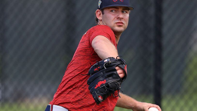 030822 North Port: Atlanta Braves top pitching prospect Jared Shuster loosens up his arm at the Braves minor league spring training camp on Tuesday, March 8, 2022, in North Port.  “Curtis Compton / Curtis.Compton@ajc.com”`