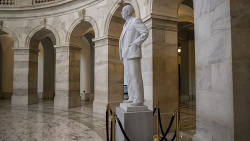A statue of U.S. Sen. Richard Russell of Georgia stands in the rotunda of a Senate office building named after him. After the death of U.S. Sen. John McCain of Arizona this weekend, Senate Democratic leader Chuck Schumer said he will introduce a resolution to rename the Russell Senate Office Building to honor McCain. (AP Photo/J. Scott Applewhite)