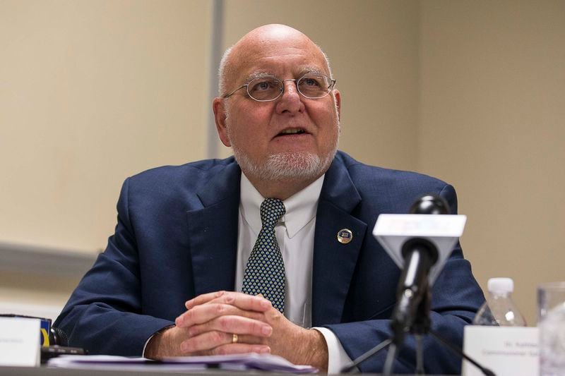 CDC Director Robert Redfield began his career at Walter Reed Army Medical Center and became well known for studying the spread of HIV. He promoted placing infected soldiers in quarantine and aligned himself with an evangelical Christian group that pushed for abstinence-only programs. But he has since tempered his views. Redfield is seen here in December speaking during a panel discussion on stopping the spread of HIV. ALYSSA POINTER / ALYSSA.POINTER@AJC.COM