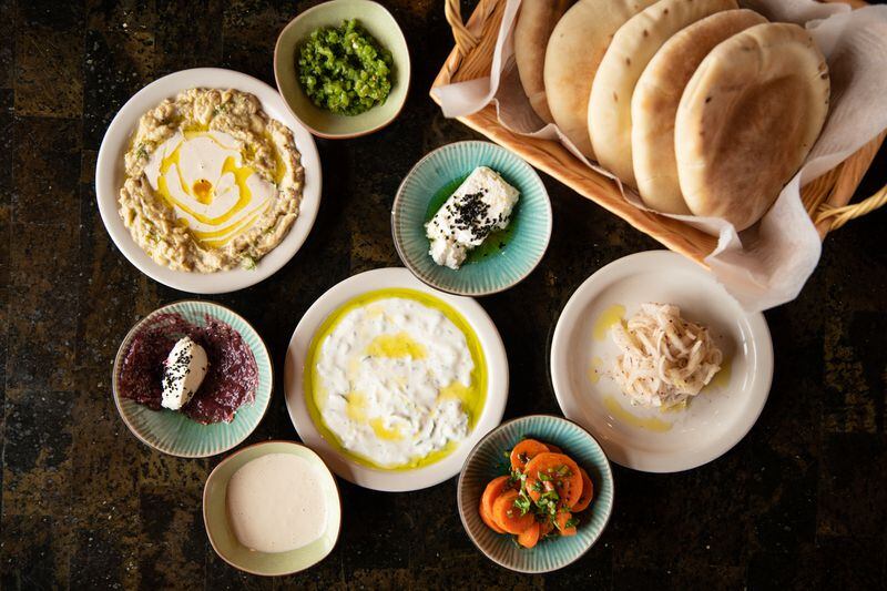 Nur Kitchen's mezze platter offers plenty of it while you wait for your main courses.  (Mia Yakel for The Atlanta Journal-Constitution)