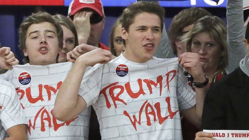 Young supporters of Donald Trump chanted "Build that wall" last year in Wisconsin. (AP Photo/Charles Rex Arbogast)