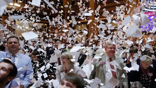 3/29/18 - Atlanta - House members toss papers in the air as Sine Die was proclaimed shortly after midnight.  Thursday was the 40th and final day of the 2018 General Assembly.    BOB ANDRES  /BANDRES@AJC.COM