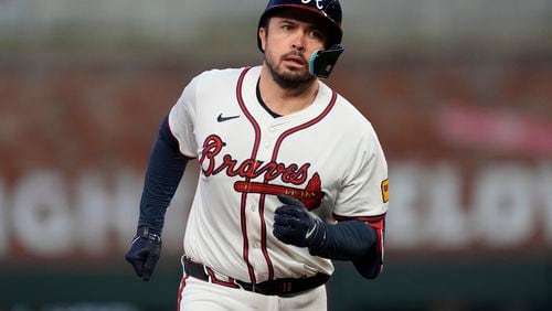 Atlanta Braves' Travis d'Arnaud runs the bases after hitting a two-run home run in the fourth inning of a baseball game against the Miami Marlins Monday, April 22, 2024, in Atlanta. (AP Photo/John Bazemore)