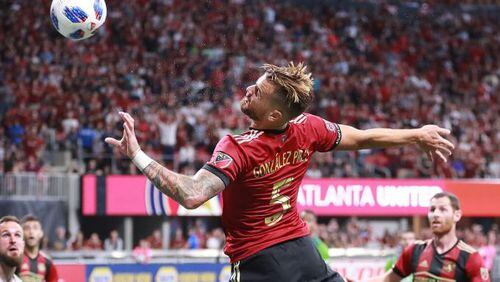 Atlanta United defender Leandro Gonzalez Perez has his header bounce off the goal post just missing a goal against the Seattle Sounders during the second half in a MLS soccer match on Sunday, July 15, 2018, in Atlanta.     Curtis Compton/ccompton@ajc.com