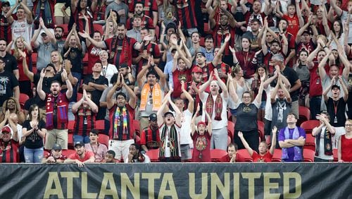 Atlanta United fans cheer for their team earlier this season.
