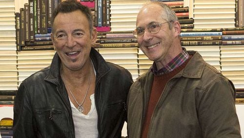 AJC Reporter Craig Schneider meets Bruce Springsteen at a book event in Kennesaw. It was a great moment in his life, and it freaked him out.