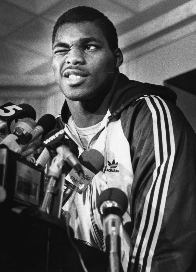 Herschel Walker winks at the cameras during an interview about his football career path, circa 1980. Michael Pugh / AJC file photo
