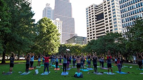 Free yoga classes return April 1 and will take place Saturdays in Woodruff Park. (FILE/PHOTO CONTRIBUTED)