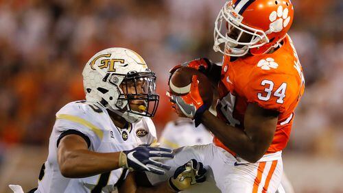 ATLANTA, GA - SEPTEMBER 22:  Ray-Ray McCloud #34 of the Clemson Tigers pulls in this reception against A.J. Gray #15 of the Georgia Tech Yellow Jackets at Bobby Dodd Stadium on September 22, 2016 in Atlanta, Georgia.  (Photo by Kevin C. Cox/Getty Images)