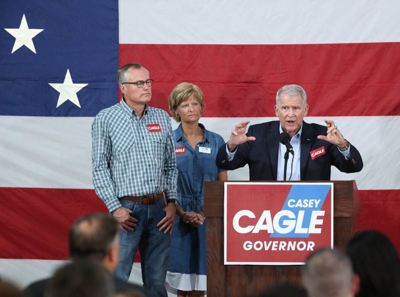 NRA President-elect Oliver North, right, speaks next to Lt. Gov. Casey Cagle and his wife Nita at the Governors Gun Club Saturday, July 14, 2018, in Kennesaw, Ga. (JASON GETZ/SPECIAL TO THE AJC)